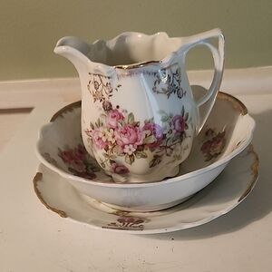 Floral Porcelain Creamer and Saucer Set